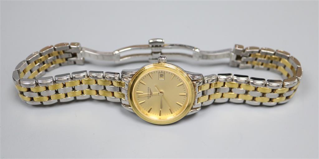A ladys 2006 stainless steel and yellow metal Longines quartz wrist watch with date aperture, box and booklet,